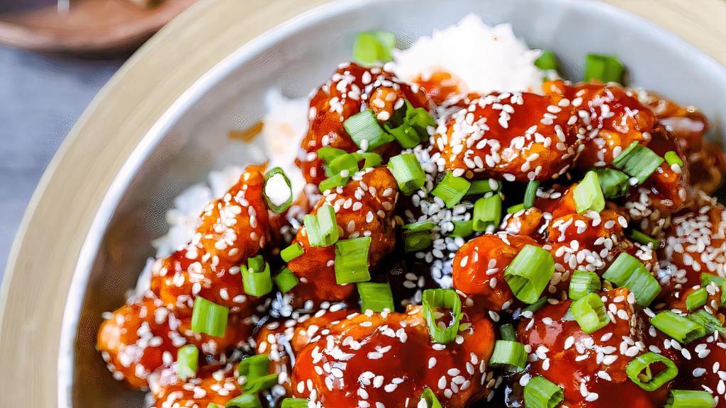 Sesame Chicken · Spicy. Battered chicken chunks, fried and glazed with our own spicy honey sauce, topped with sesame seeds.