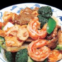 Triple Delight · Stir-fried shrimp, chicken and beef with fresh mixed vegetables in our rich brown sauce.