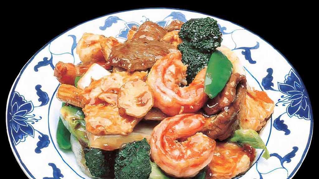 Triple Delight · Stir-fried shrimp, chicken and beef with fresh mixed vegetables in our rich brown sauce.