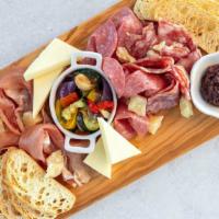 Italian Charcuterie Board · A mix of thin slices of prosciutto, Genoa & Milano salamis, fontina and parmesan cheeses acc...