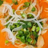 Chicken Curry Noodle Soup · Yellow curry broth flavored with turmeric, coconut crème, and lime leaves. Served with chick...