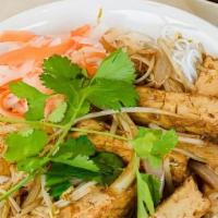 Tofu Vermicelli Noodle Salad (V) · Served on a bed of lettuce, mints, cucumber, bean sprouts, carrots, daikon, peanuts and side...