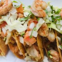 Taco Rico · Five crunchy or 4 soft shell sautéed shrimp or beer battered fish tacos with cabbage, cilant...