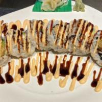 Rock N Roll Sushi · Deep Fried crab and Shrimp, rolled in with avocado, cucumber, n cream cheese, topped with sp...