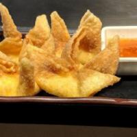 Iron Chef Rangoon · Fried wonton wrapper filled with crab and cream cheese.