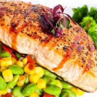 Fresh Grilled Salmon · Grilled salmon drizzled with a bourbon sriracha sauce with edamame succotash.