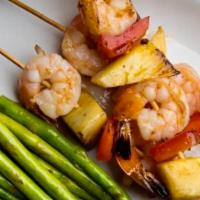 Honey Pineapple Shrimp · Grilled shrimp skewers seasoned and brushed with a delicious honey