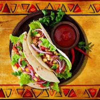 Pastor Taco Samurai · Our top selling pork taco is seasoned perfectly. Tacos are made on corn tortilla with salsa ...