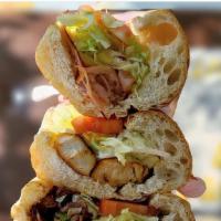 Veggie Sub · Mushrooms, onions, green peppers, mild peppers, lettuce, tomato, cheese, mayo and Italian dr...