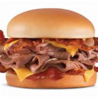 Monster Roast Beef · Sliced roast beef and melted American cheese served on a potato bun. Served with Horseradish...