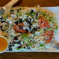 Antipasto Salad · Blend of crispy Romaine and organic green mix topped with grape, tomatoes, yellow pepper rin...