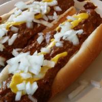 Coney Island Hot Dog · Our famous hot dog topped with chili, mustard & onions.
