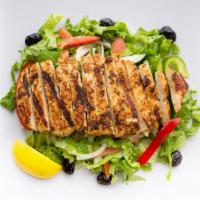 Chicken Breast Salad · Grilled chicken breast over a salad of chopped lettuce, red cabbage, tomatoes, onions, and c...