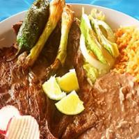 Carne Asada Platter · Popular, spicy. Grilled steak with onion, jalapeños, rice, beans, topped with shredded chees...