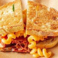 Mac Brisket Sandwich · Smoked beef brisket, classic mac and cheese, grilled sourdough (knife and fork). With choice...