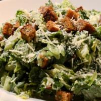 Caesar Salad · Romaine hearts, Parmesan croutons, shaved Parmesan, Caesar dressing.