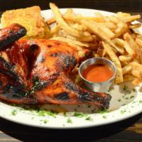 Harrison Farms 1/2 Bbq Chicken · With BBQ sauce. Includes two sides and our house-made cornbread.