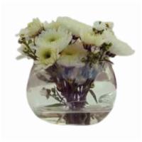 Isle Of White · This calming bouquet is delicately arranged with fragrant white Asiatic lilies, crème roses ...