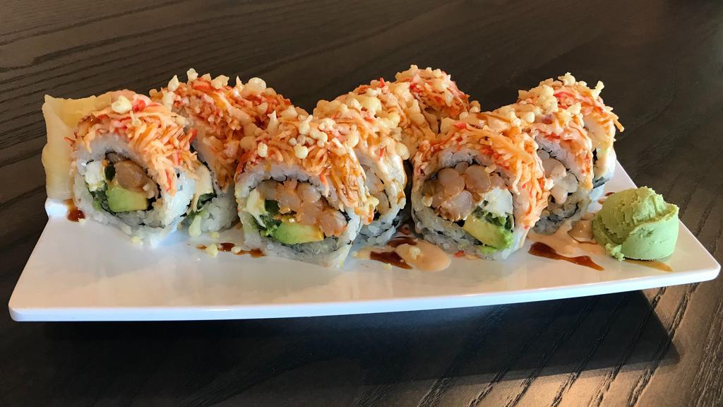 Firecracker Shrimp Roll · Inside out seaweed wrap - spicy shrimp, spicy crab, jalapeno, cream cheese, avocado topped with yummy sauce, eel sauce and tempura crisps.