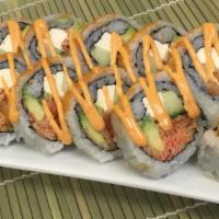 Dynamite Roll · Shrimp tempura, spicy crab mix, avocado, cucumber, Philadelphia Cream Cheese, and topped wit...