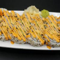 Shrimpin' Ain'T Easy Roll · Inside-out seaweed wrap, tempura shrimp, avocado, asparagus, BOSS sauce and sesame seed.