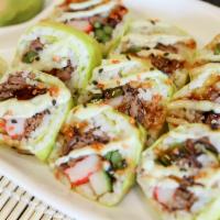 Surf And Turf Roll · Soy wrap, our marinated short rib beef, crab stick, cucumber, asparagus, wasabi mayonnaise, ...