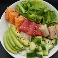 Chirashi Bowl · Sushi Rice, green leaf lettuce, cucumber, avocado, Salmon, Tuna, Yellow Tail topped with ses...