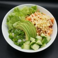 Spicy Crab Salad Bowl · Sushi rice, spicy crab, avocado, green onion, cucumber, green leaf lettuce & topped with Bos...