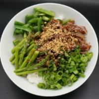 Short Rib Beef Bowl · Sushi rice, short rib beef, asparagus, green onion, jalapeno and topped with yakisoba sauce,...