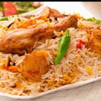 Special Chicken Biryani · Flavored basmati rice and tender pieces of flavored chicken cooked with herbs.