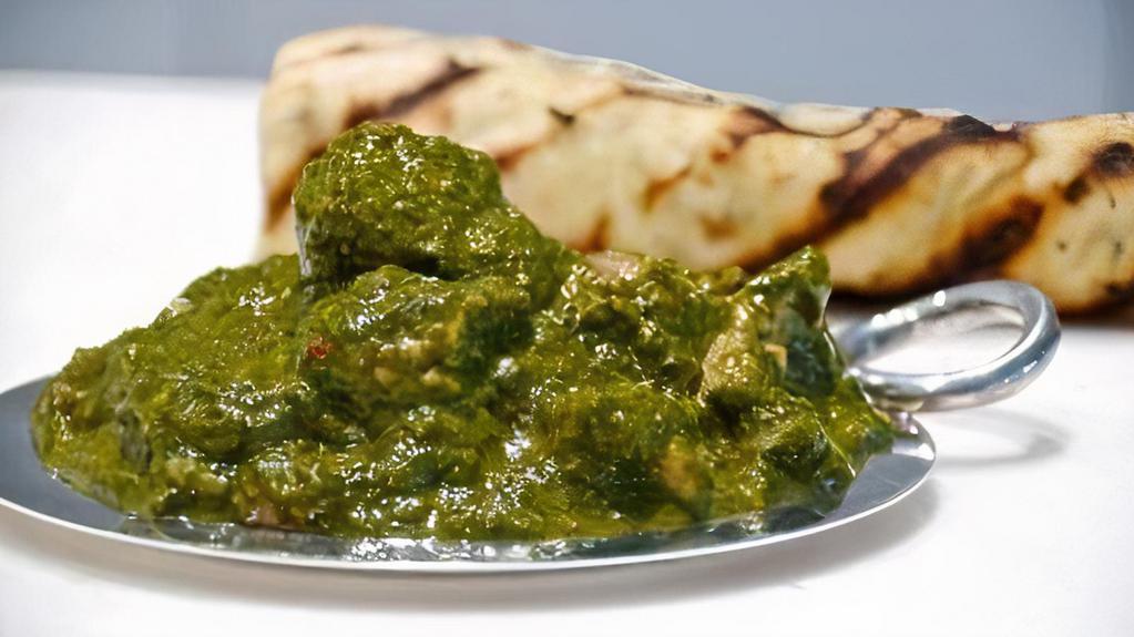 Chicken Saag · Chicken cooked with spinach, herbs and spices. Rice is complimentary