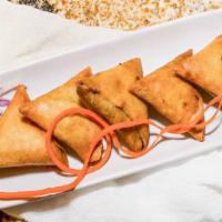 Samosa (2) · Fried pastry with a savory filling of spiced potatoes, onions and peas