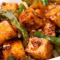 Chilli Paneer · Batter fried Paneer cubes tossed with onion, capsicum, garlic, and green chilies