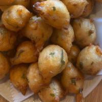 Punugulu · Deep fried snack made with rice flour, urad dal and other spices