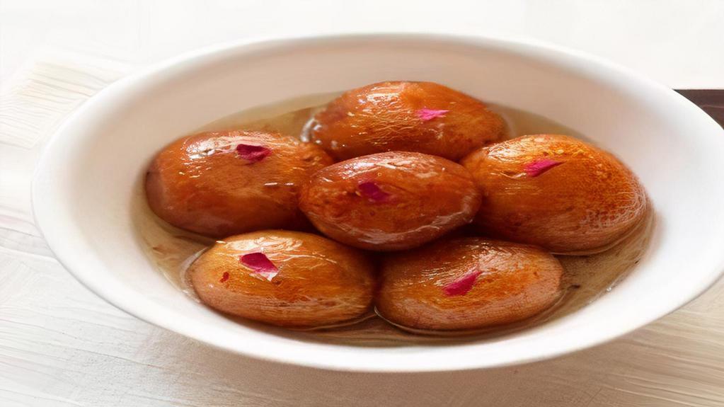 Gulab Jamun(4) · Dry milk dumplings fried and soaked in sugar syrup.