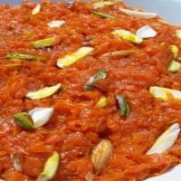 Carrot Halwa · Carrot based sweet dessert pudding made with grated carrot, sugar, milk and ghee
