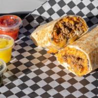 Ground Beef & Sautéed Onions Burrito · Ground beef and sautéed onions with Mexican yellow rice and Texas style black beans on a flo...