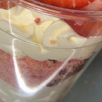 16Oz Strawberry Crunch Cheesecake Cup · cheesecake filled with strawberry crunch crumbs and real strawberry slices