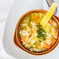 Homemade Chicken Lemon Soup · Served with a pita bread.