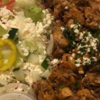 Grilled Chicken Gyro Bowl · A bed of our homemade Greek rice or mujadara (lentils and rice) topped with our fresh grille...