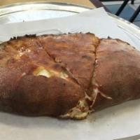 Supreme Calzone · Pepperoni,Canadian bacon, beef, sausage, onions, mushrooms, green peppers and cheese