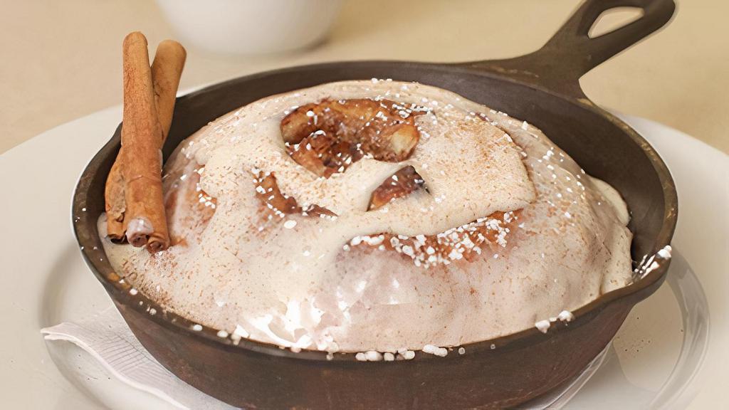House-Made Cinnamon Roll · Croissant pastry dough filled with butter, brown sugar and cinnamon, baked in a. cast-iron skillet and topped with sweet vanilla bean icing.
