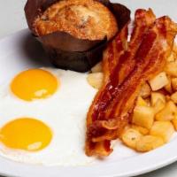 Zax I Am Fried Eggs And...(With Meat) · Two eggs any style with skillet potatoes and an Everything muffin with choice of Ham, Bacon,...