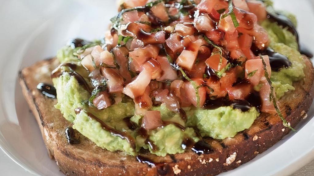 Avocado Toast · Bruschetta joins a wild balsamic glaze served on top of fresh avocados and wheatberry. toast. Presented with fresh fruit