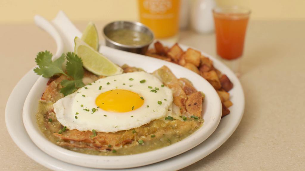 Mexico City Chilaquiles · Mexico-style breakfast. with corn tortillas, beans,. salsa verde, queso blanco, an. egg any style and your choice. of pulled chicken or ground. chorizo. Served with skillet. potatoes and a shot of. jugo de limón y chile