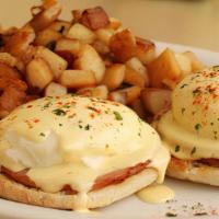 Eggs Bennie · Toasted English muffin, Canadian. bacon, poached eggs, fresh hollandaise. and smoked paprika...