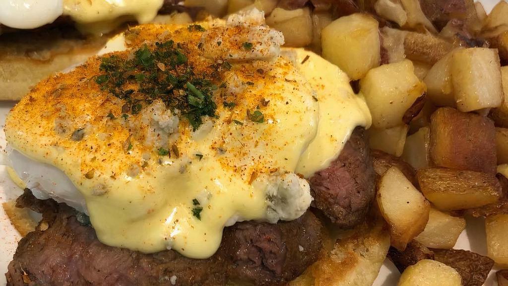 Steak Bennie · Seared sliced sirloin, poached. eggs on an English muffin. topped with fresh hollandaise.. Served with skillet potatoes