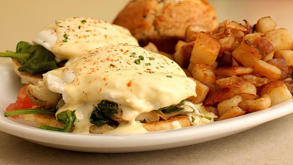 Veggie Bennie Florentine · Toasted English muffin, sautéed. spinach, tomatoes, poached eggs,. fresh hollandaise and smoked paprika.. Served with your choice of skillet. potatoes or grits
