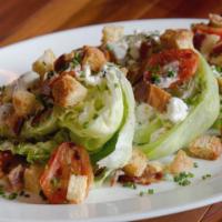 Unwedge Salad · Sliced baby iceberg, roasted tomatoes, Applewood smoked bacon, Brioche croutons, chives, and...