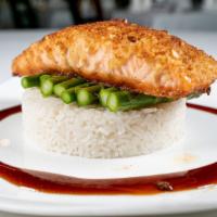 Cashew-Crusted Salmon Fillet · Broiled cashew-crusted fresh salmon served with asparagus and rice in a teriyaki glaze.